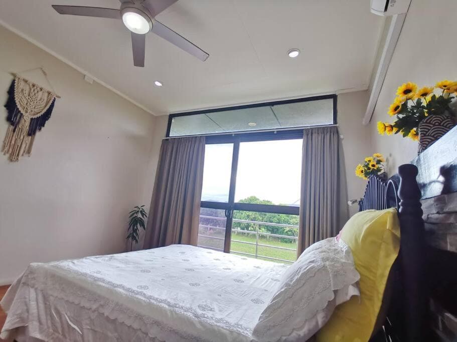 Master Bedroom in Shared Cozy River View Pool Apartment property photograph