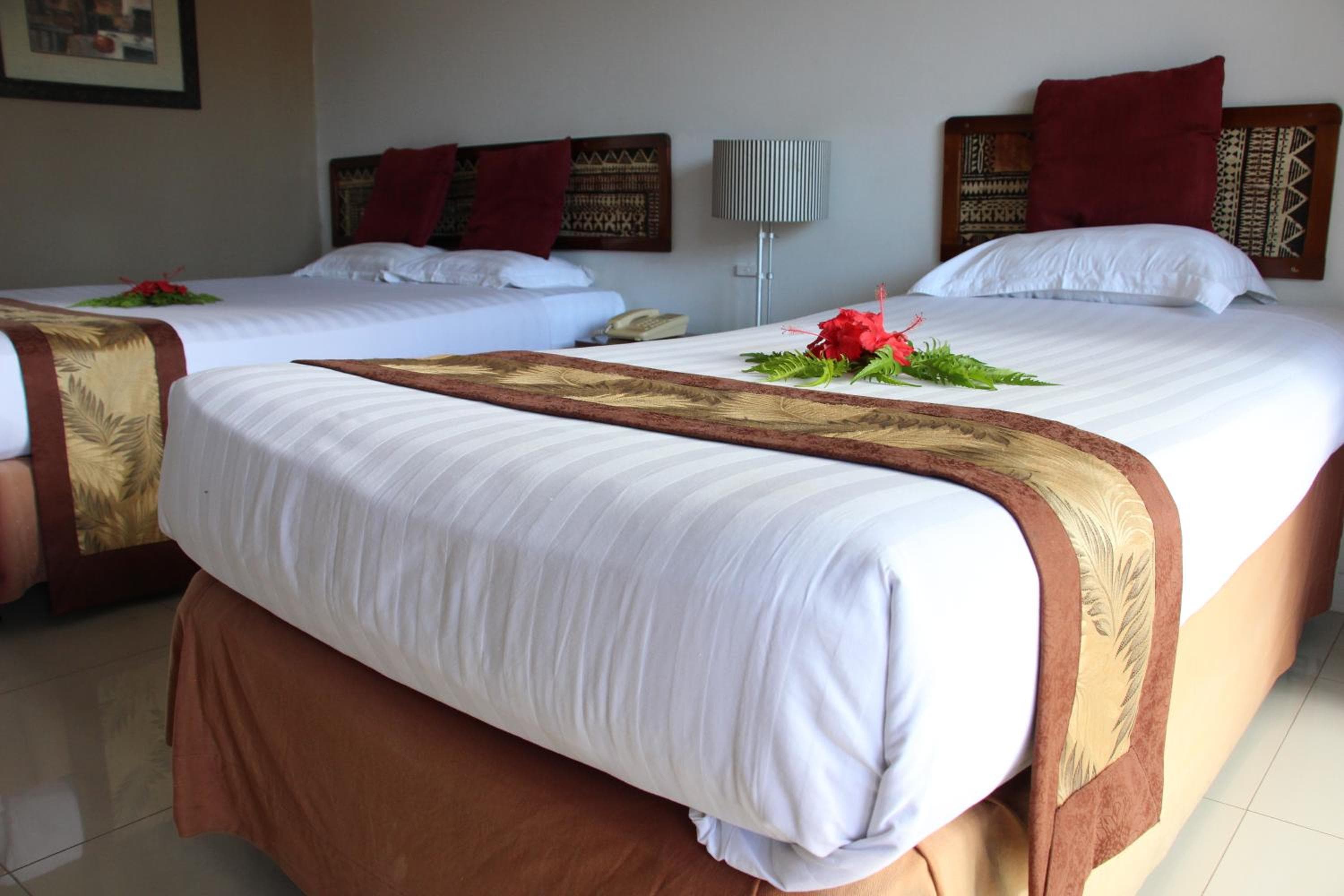 Double Or Twin Room With Pool View at Capricorn International Hotel