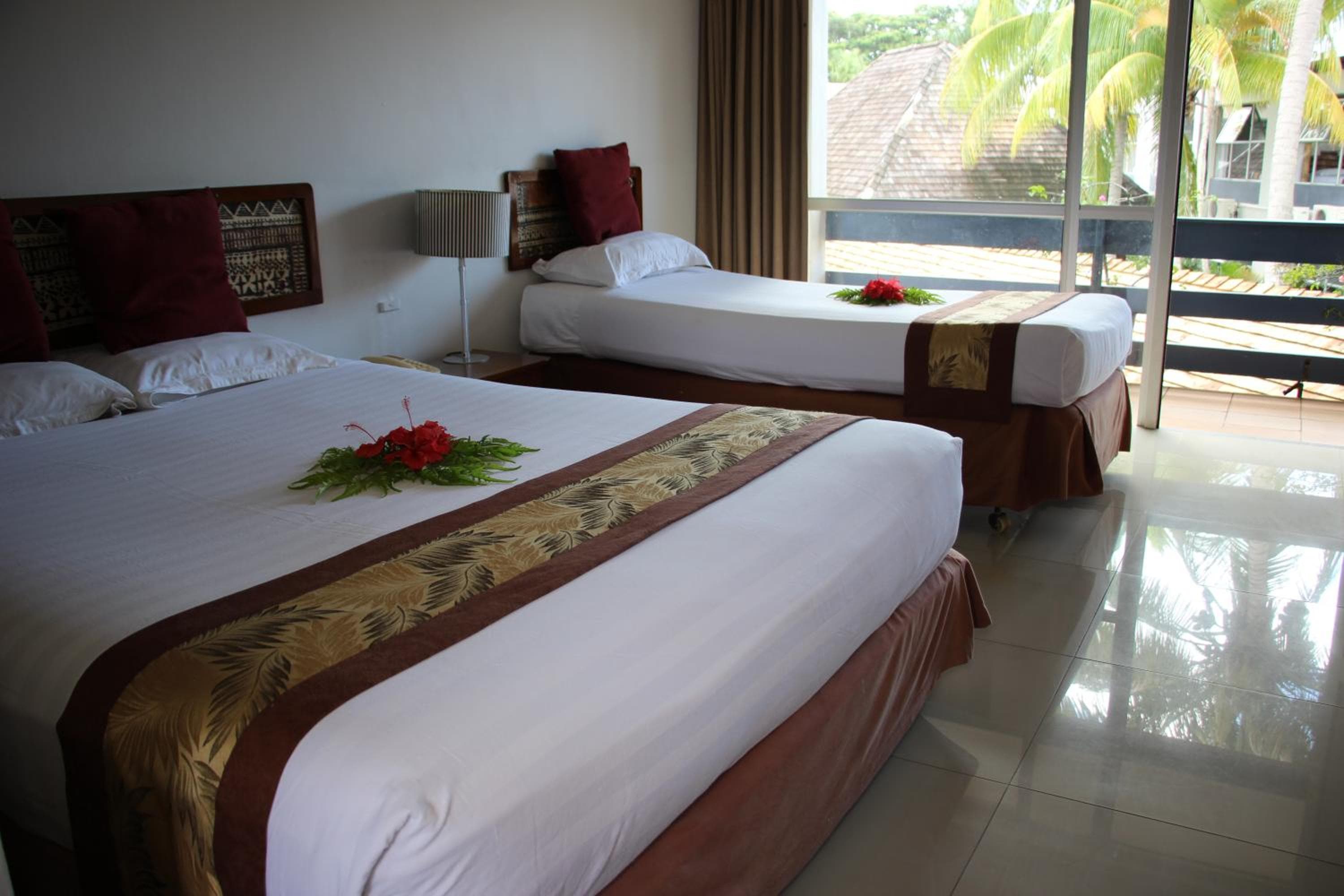 Double Or Twin Room With Pool View at Capricorn International Hotel