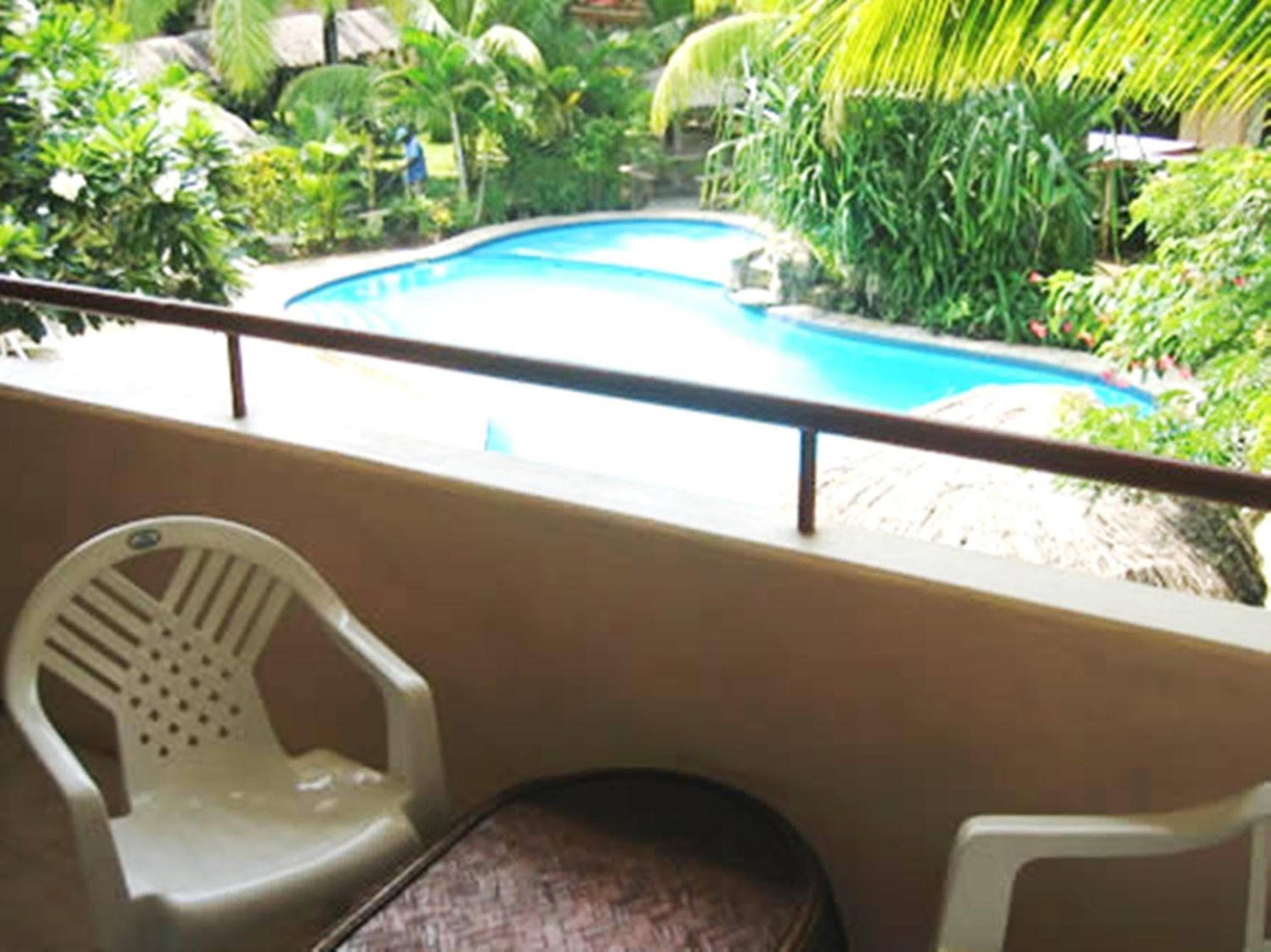 Deluxe Room - Poolside at Capricorn International Hotel