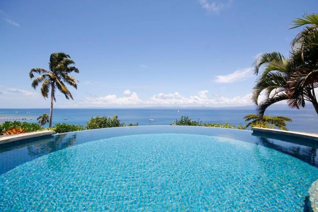 Three-Bedroom Villa at Beachfront Villa - House of Bamboo, Infinity Pool with Starlink