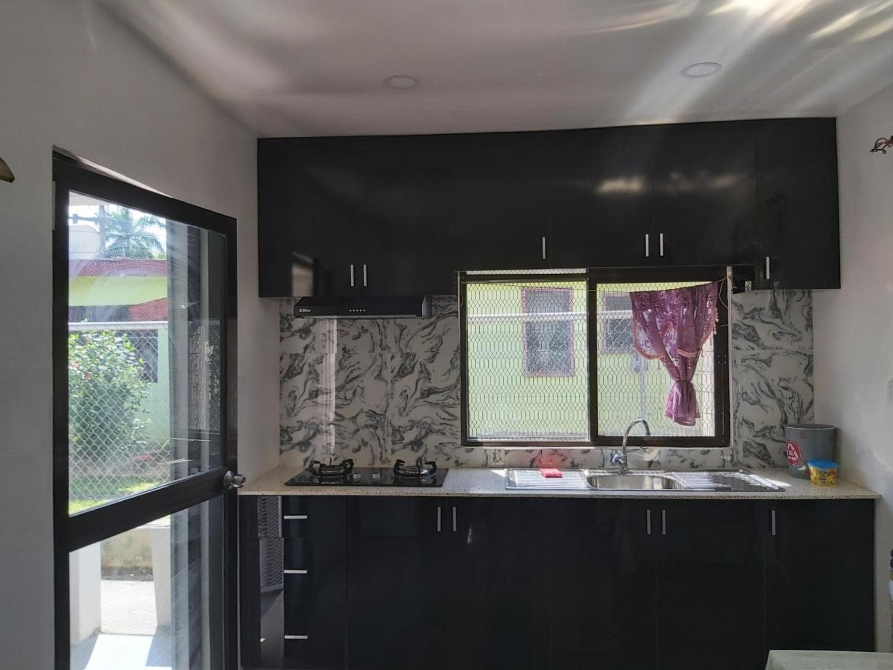 Double Room with Balcony (2 Adults + 1 Child) at SRH APARTMENT- entire 1 bedroom unit with a kitchen & a bathroom - Walking distance to stores & supermarkets - Nadi International Airport is 3km's away