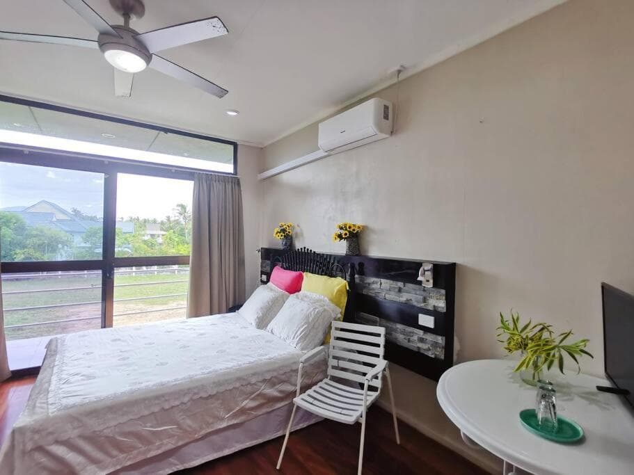 Double Room With Private Bathroom at Master Bedroom in Shared Cozy River View Pool Apartment