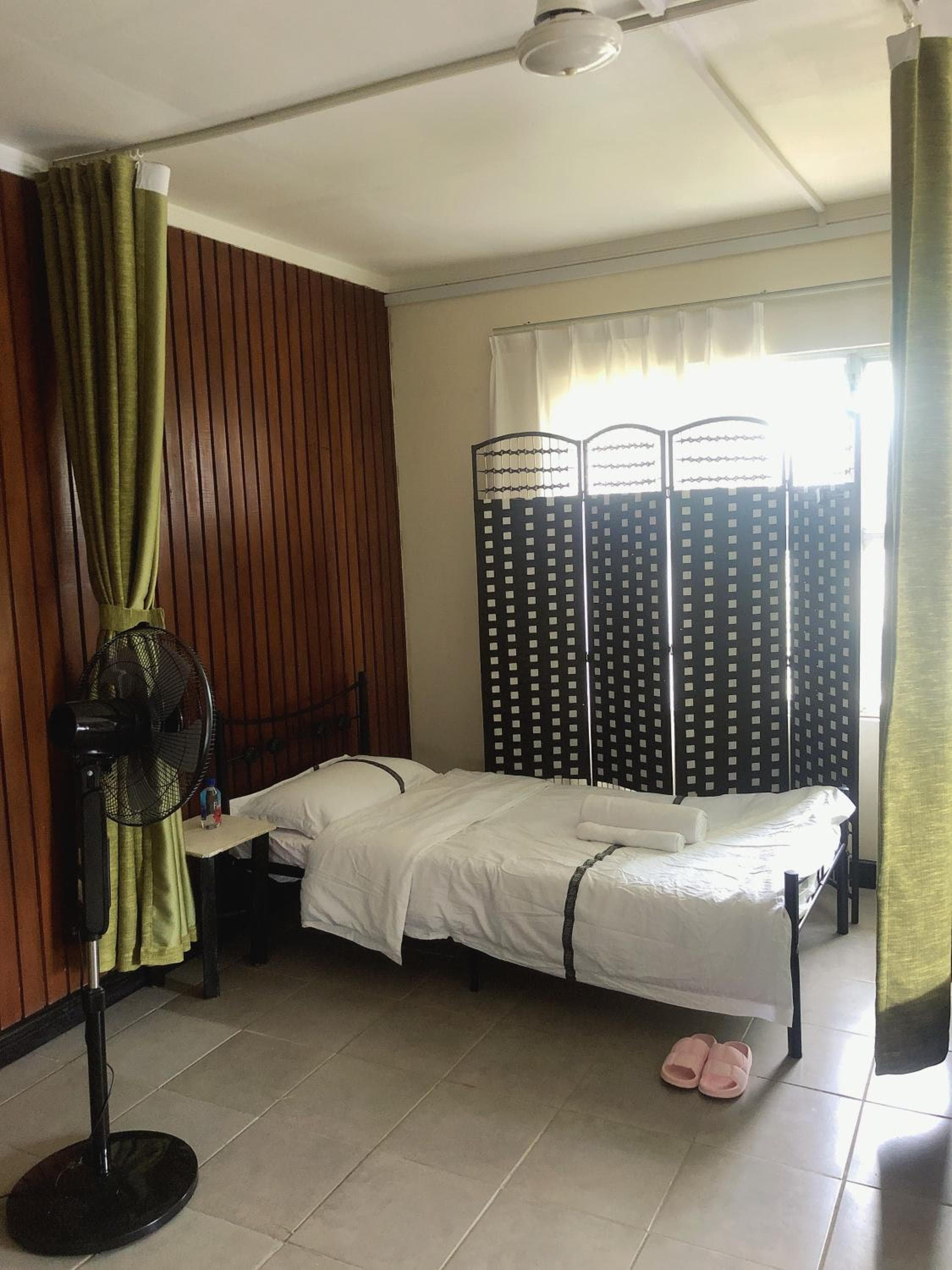 Single Bed In Dormitory Room at CC airport rooms