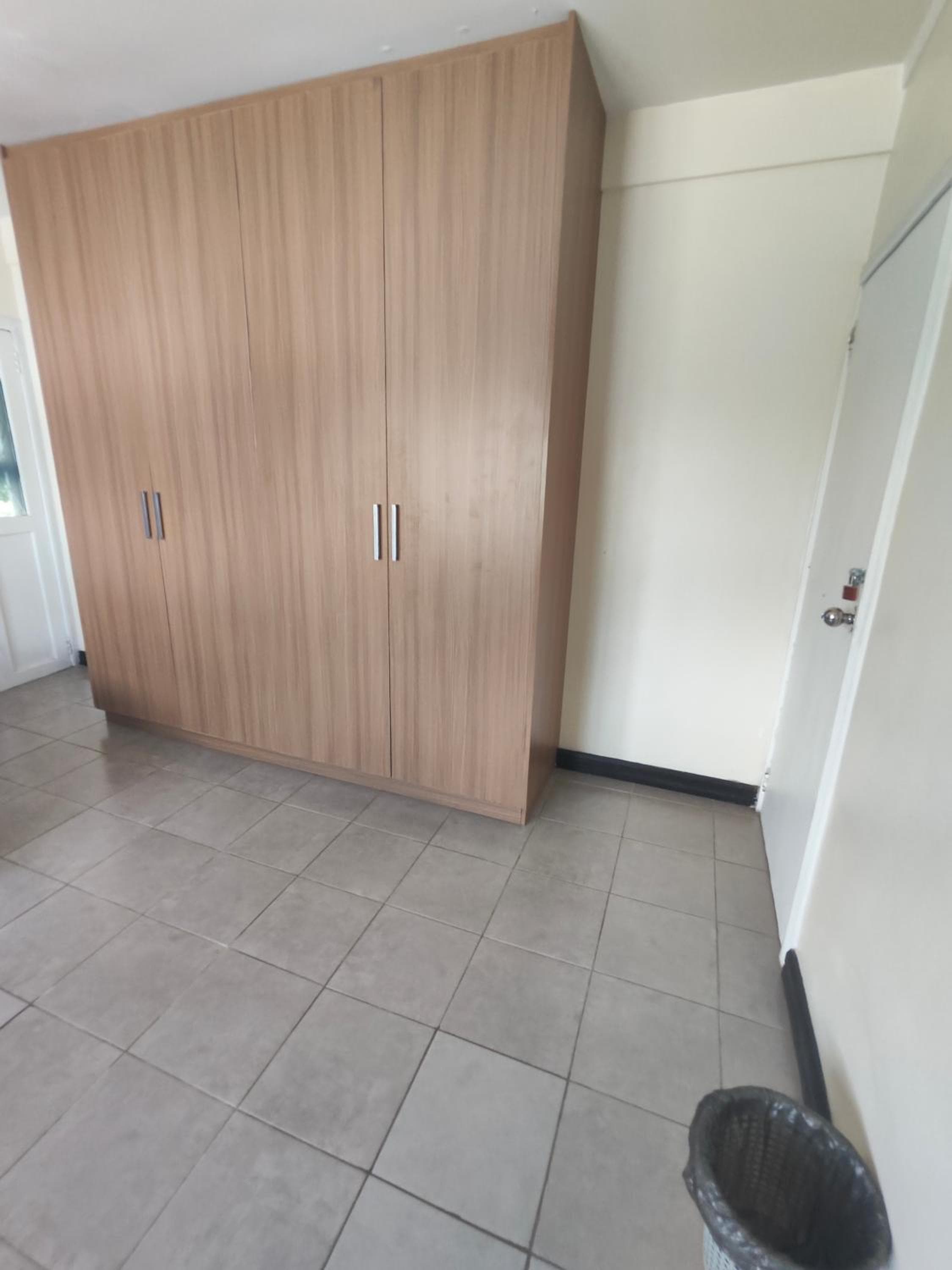 Economy Triple Room With Shared Bathroom at Airport Sky View Suites