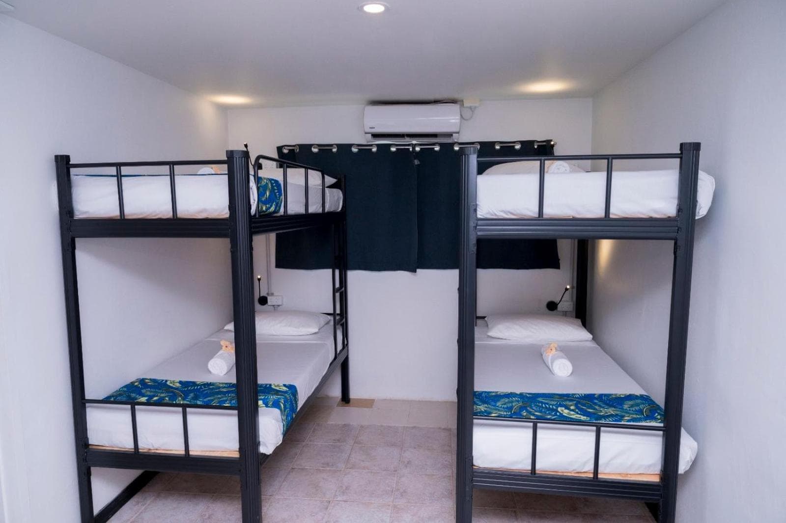 Bunk Bed in Male Dormitory Room at Sailors Beach Fiji