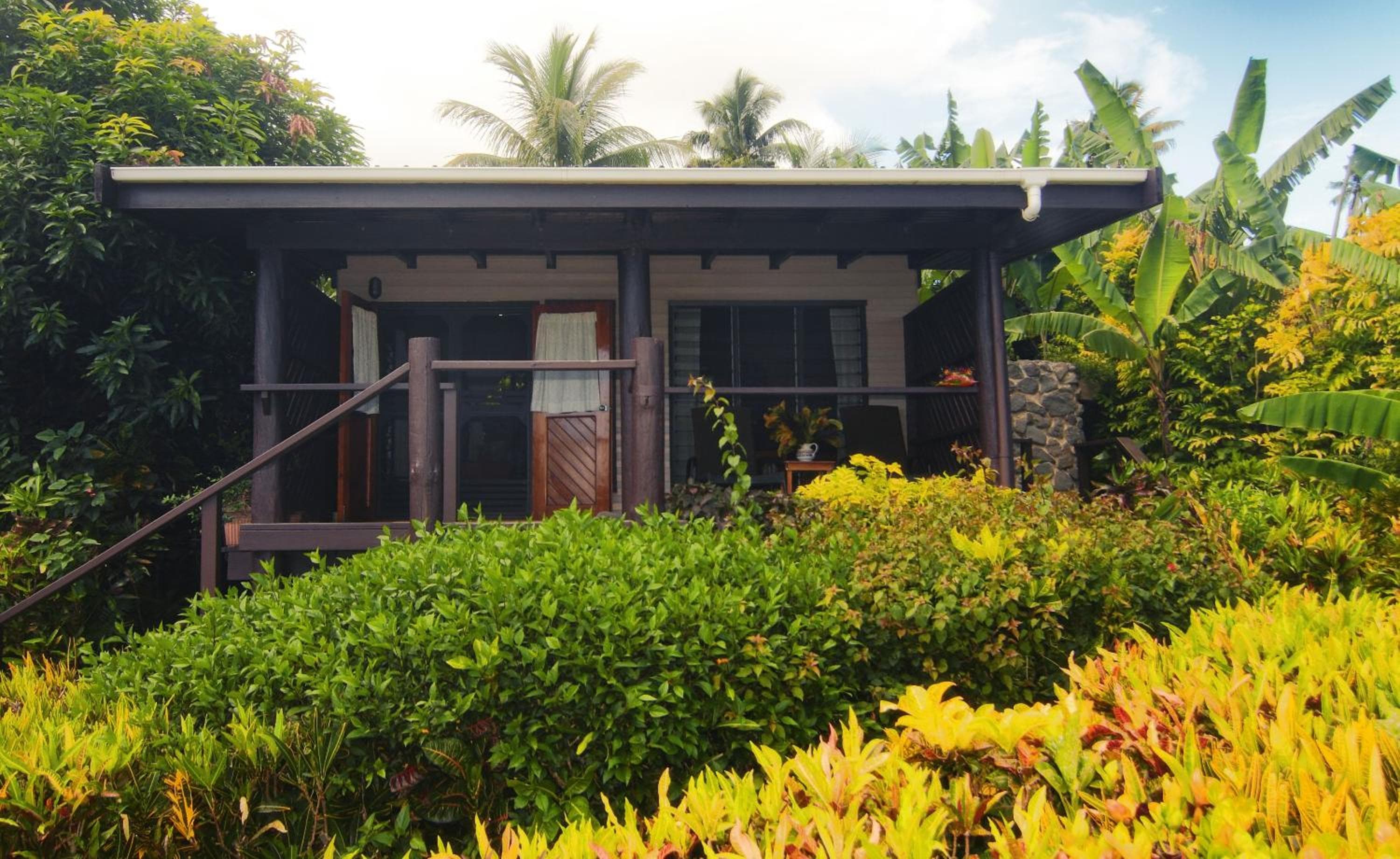 Deluxe Bungalow with Sea View at Coconut Grove Beachfront Resort