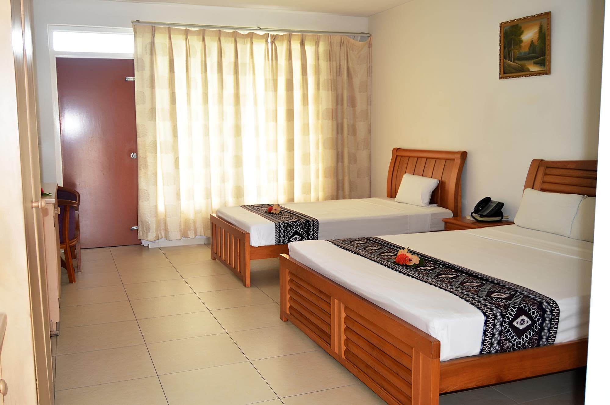 Deluxe Triple Room at Trans International Hotel