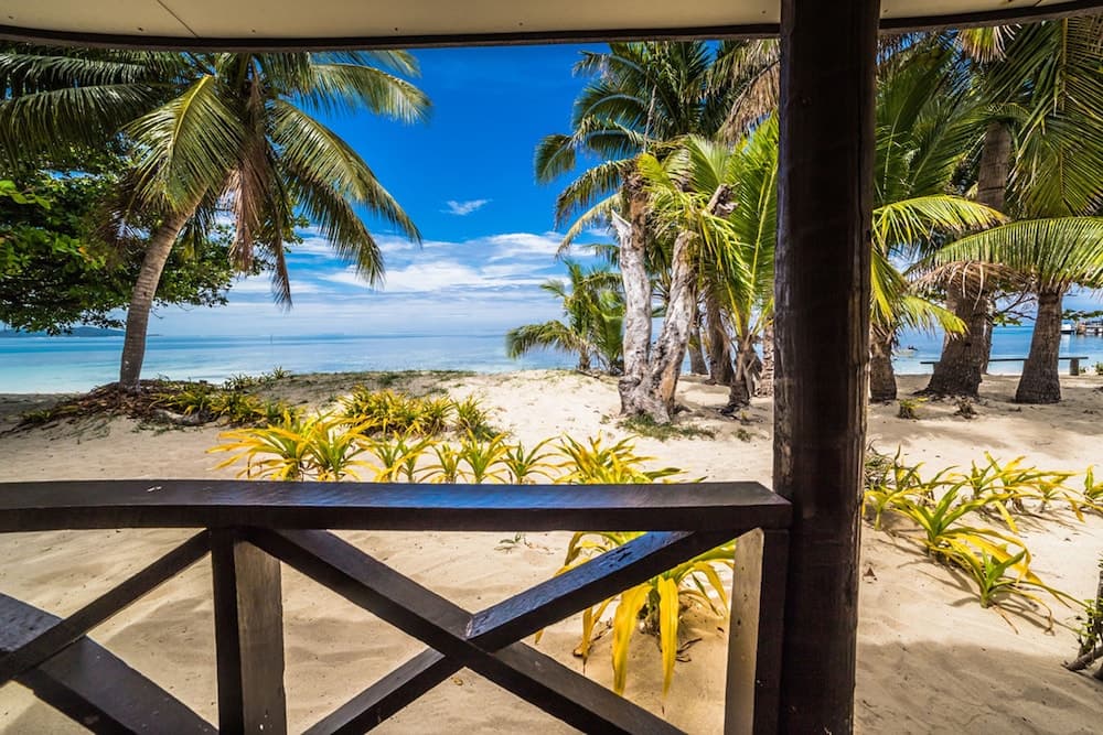 Beach Front Family Room at Ratu Kini Backpackers & Dive Resort