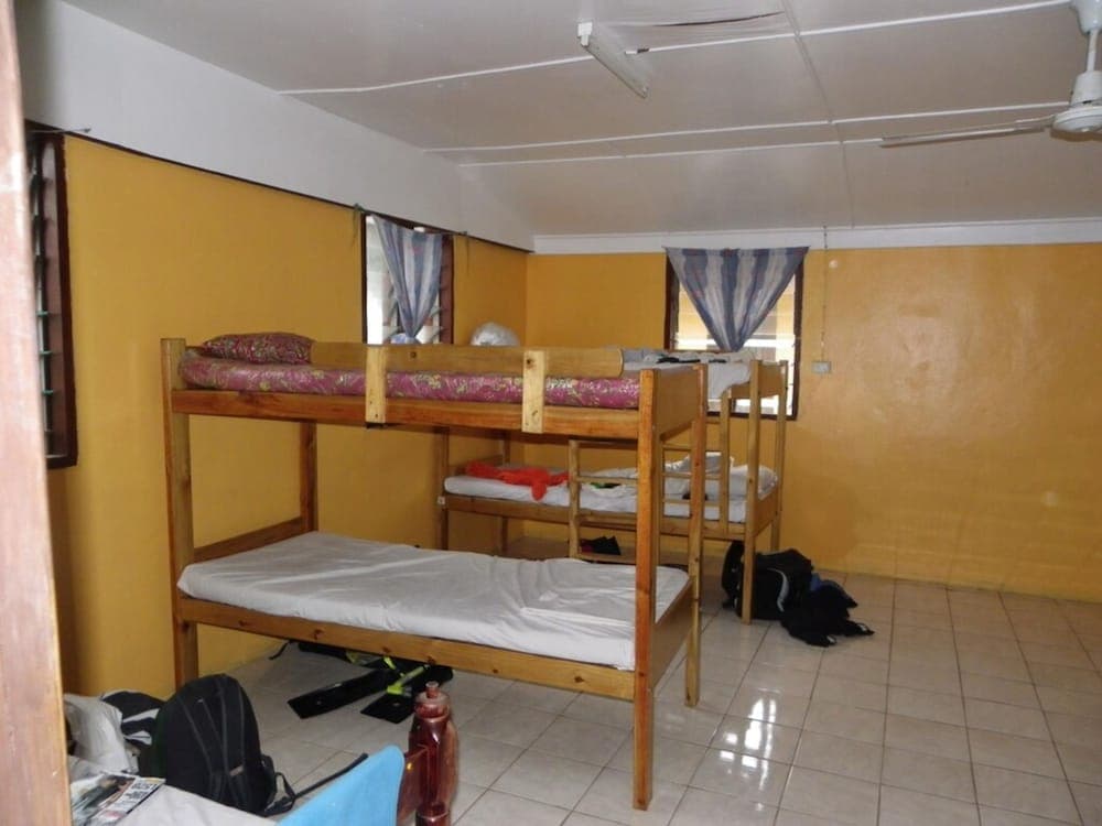 Mixed Dorm - 12 Bunk Beds at Ratu Kini Backpackers & Dive Resort