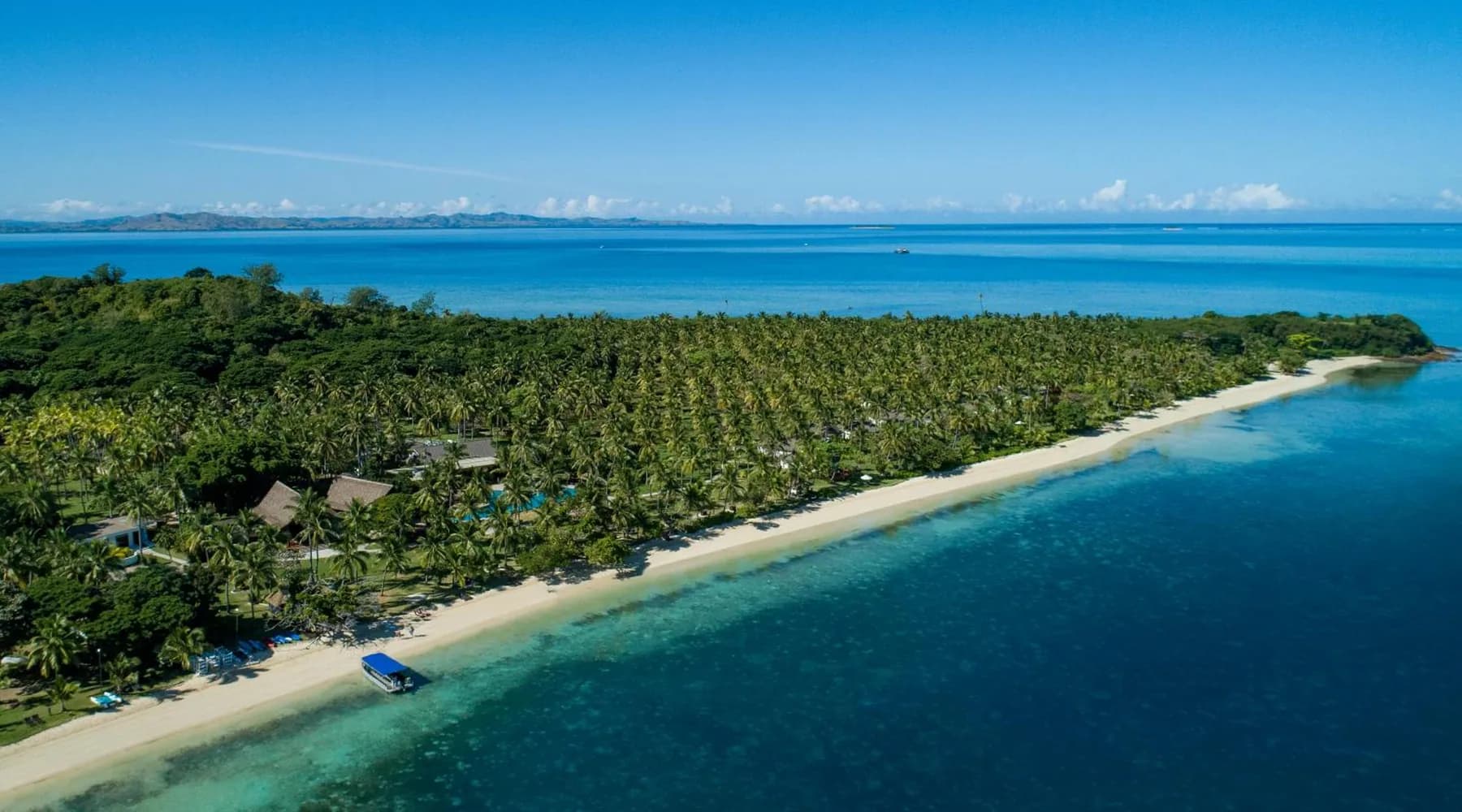 A Mamanuca island resort surrounded by blue water