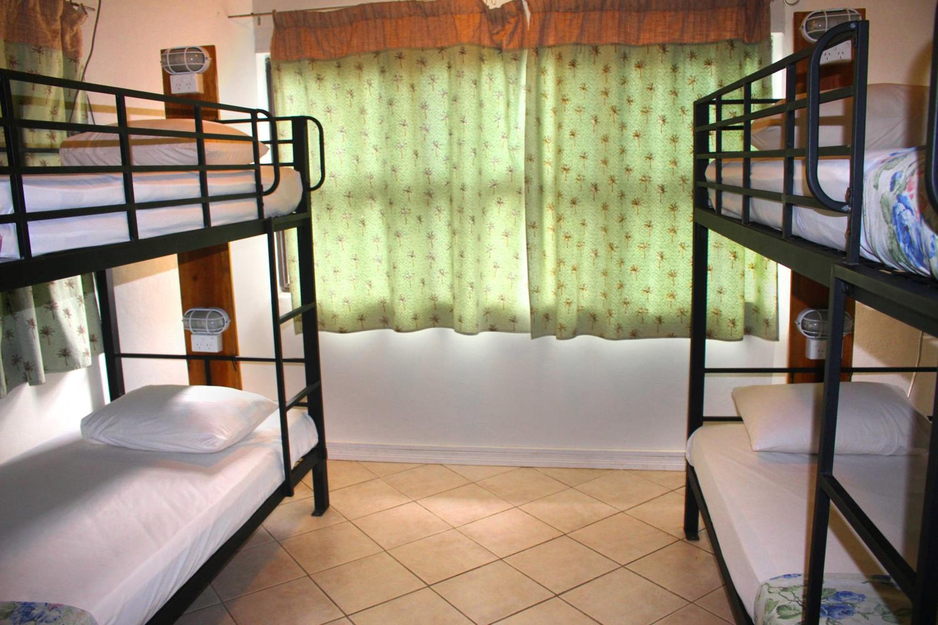 Bed in 4-Bed Mixed Dormitory Room at Bluewater Lodge