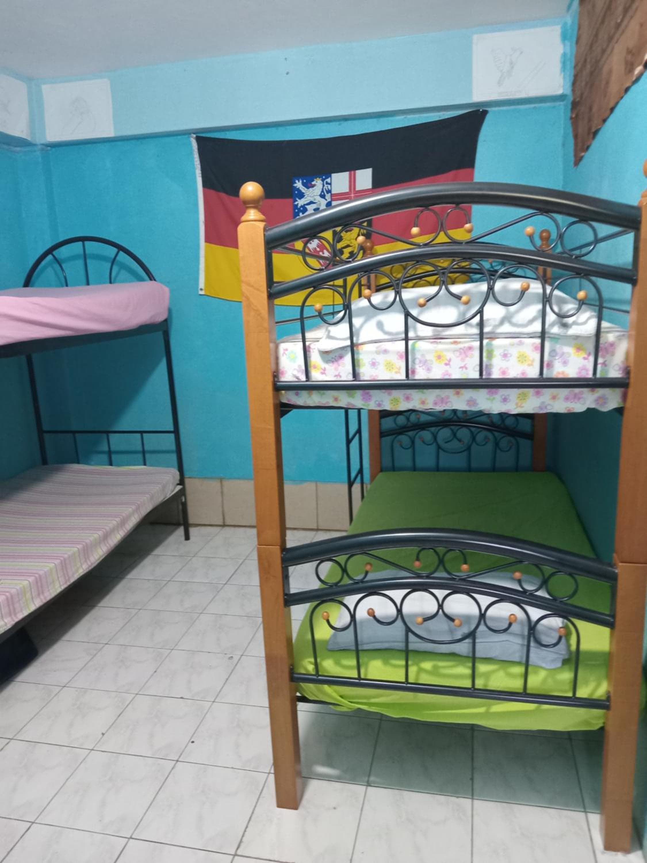Bed in 4-Bed Mixed Dormitory Room at Save's Homestay
