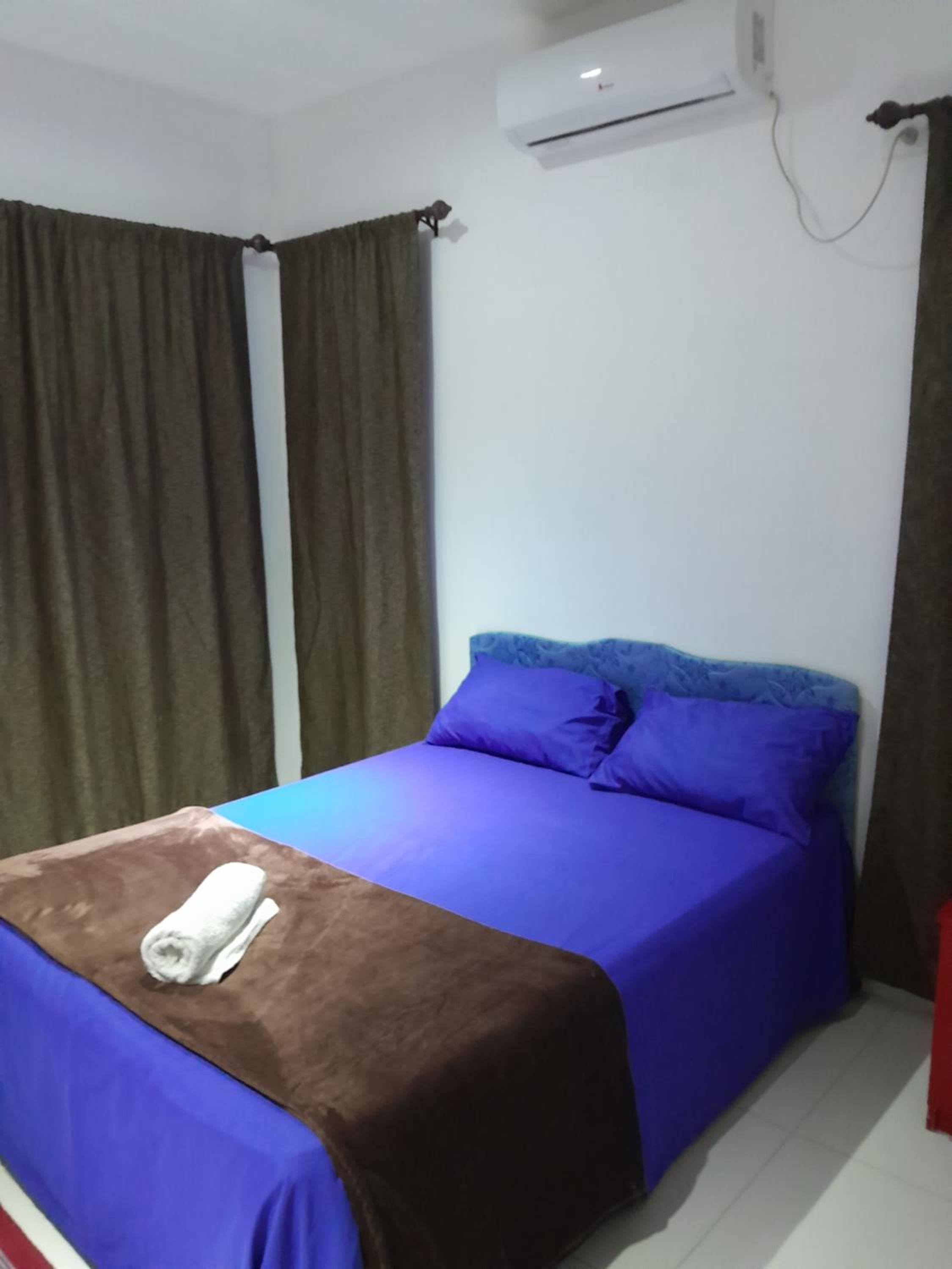 Family Room With Private Bathroom at Samayra's Apartment
