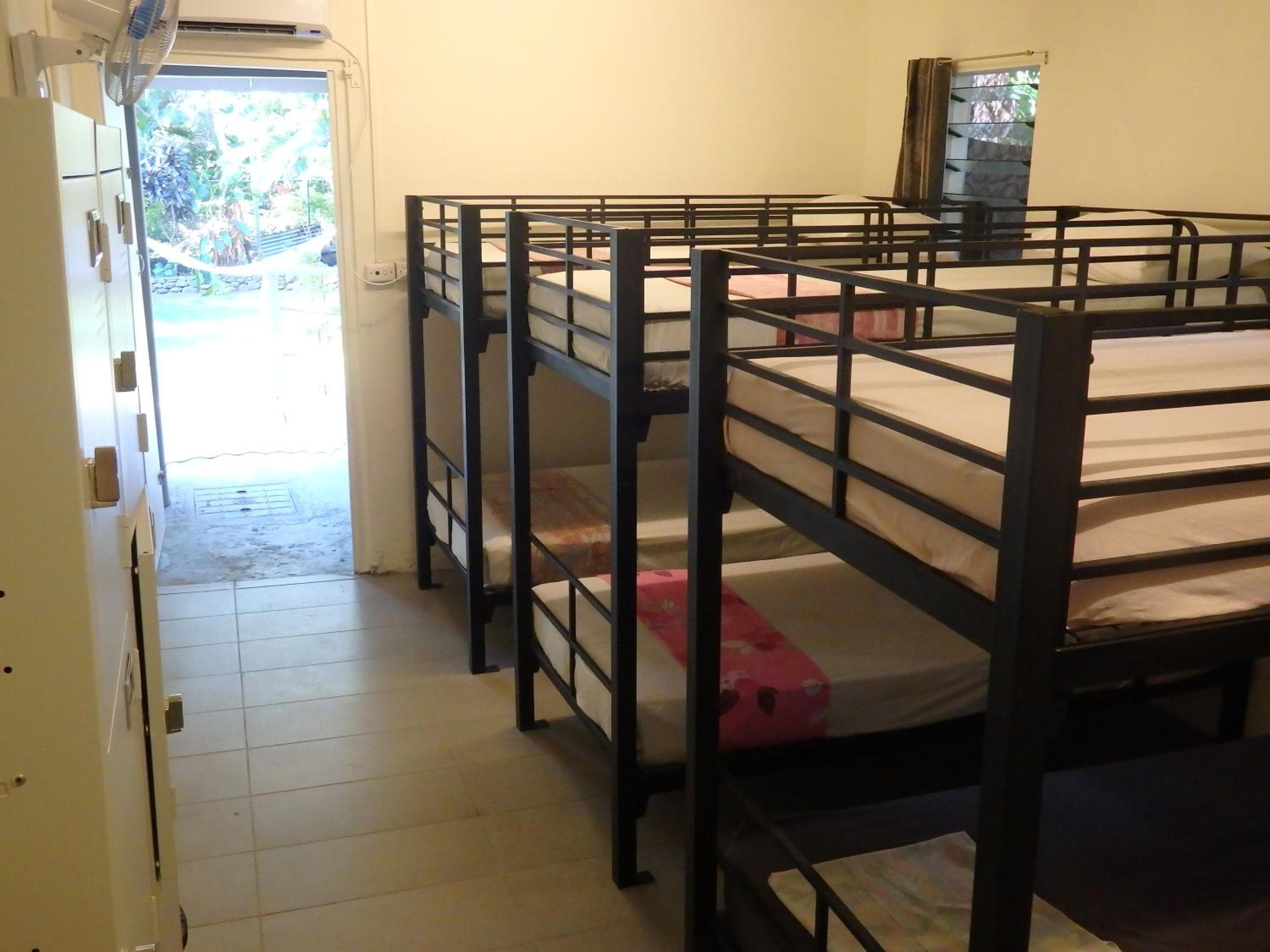 Bed in 8-Bed Mixed Dormitory Room at Bluewater Lodge