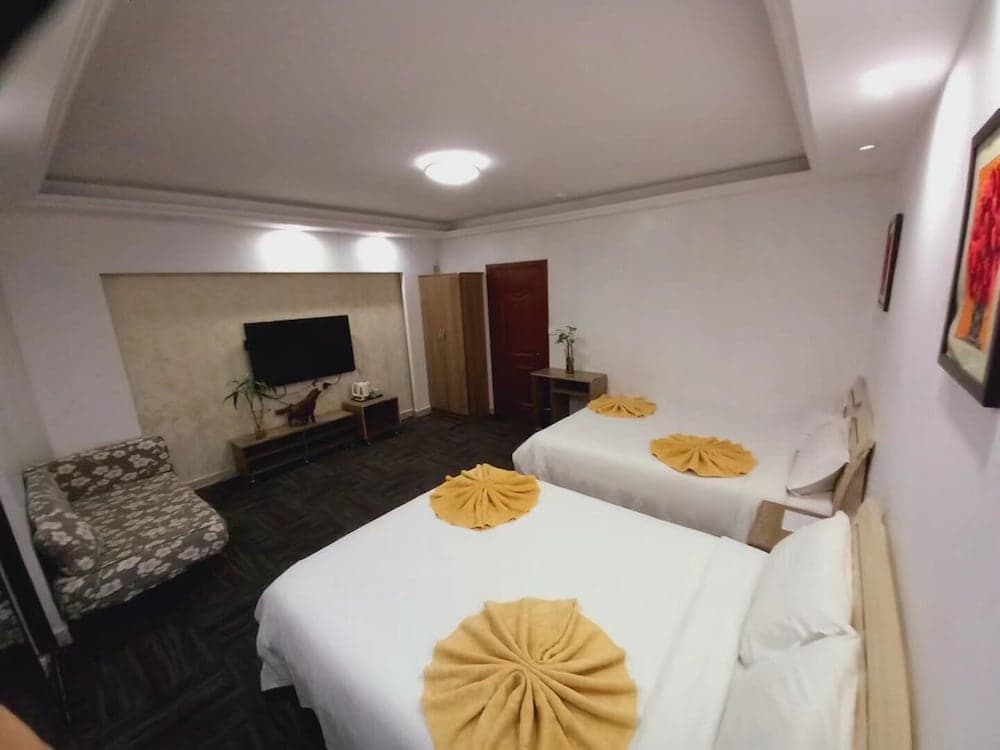 Family Room, 2 Double Beds at City Apartment