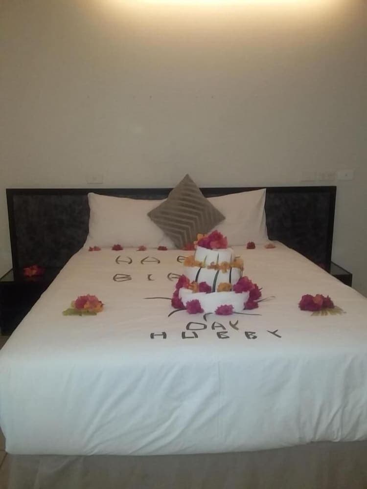 Family Double Room, Balcony, Garden Area at Hotel Oasis