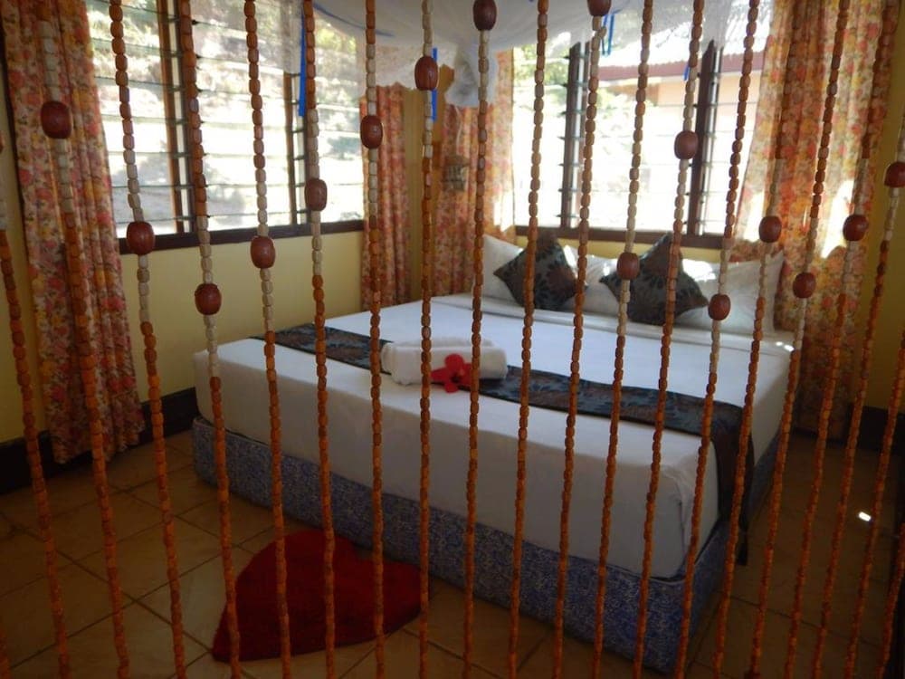 Basic Bungalow, Balcony, Ocean View at Naqalia Lodge